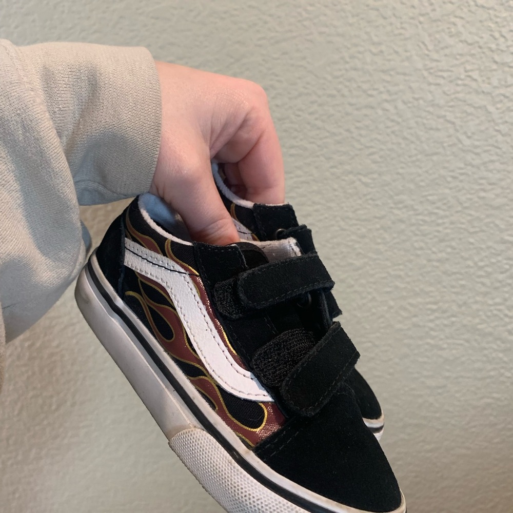 Vans Black and White Sneakers with Sleek Design and Textured Upper